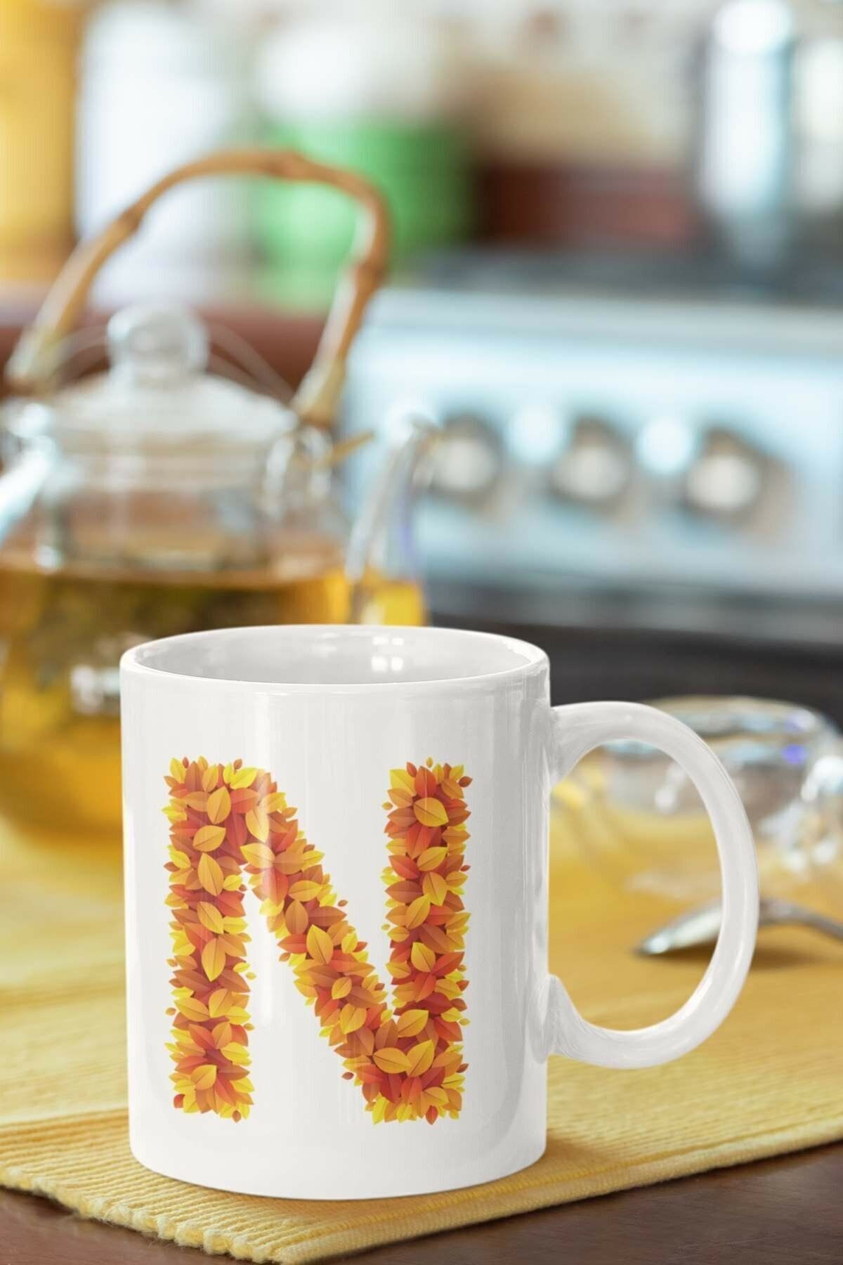 1_org_zoom-1324.jpg Beyaz Sarı Yapraklı N Harfi Baskılı Porselen Kupa - Görsel 1